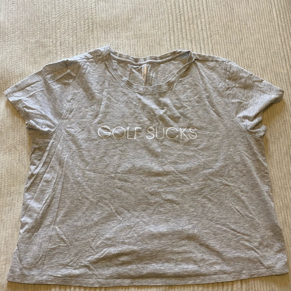 TravisMathew “Golf Sucks” Tee